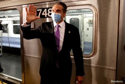 New York Governor Andrew Cuomo exits a #7 Subway train in Manhattan on the first day of New York City's phase one reopening…