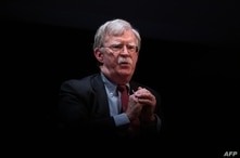 (FILES) In this file photo taken on February 17, 2020, former National Security Advisor John Bolton speaks during a public…