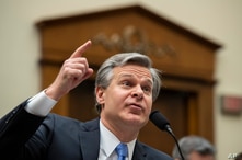 FILE - In this Feb. 5, 2020 file photo, FBI Director Christopher Wray testifies during an oversight hearing of the House…