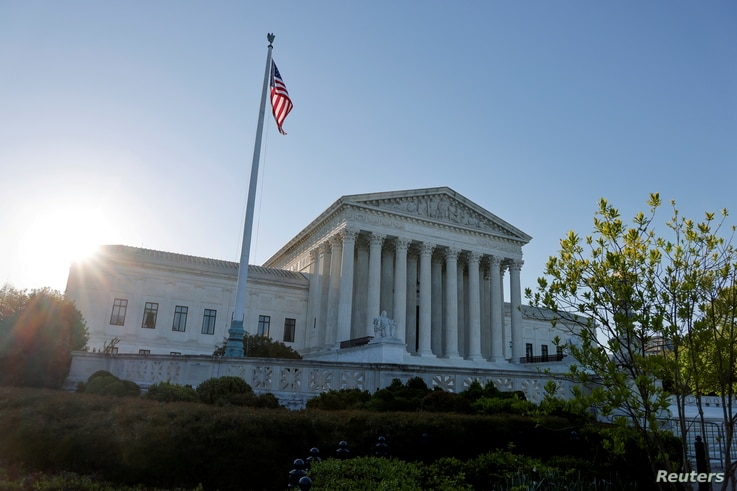FILE PHOTO: Morning rises over the U.S. Supreme Court building in Washington, U.S. April 26, 2021. REUTERS/Jonathan Ernst/File…